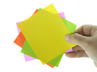 Female hand holding blank note paper isolated on transparent background.