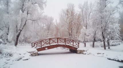 A wooden bridge over a frozen pond in a snowy forest.