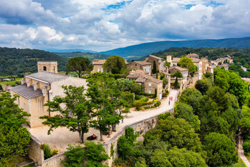 Menerbes village in Provence on a summer day, France, Luberon, Vaucluse. Village of Menerbes, the village and the Luberon mountains also called the most beautiful village of Luberon, France, Provence.