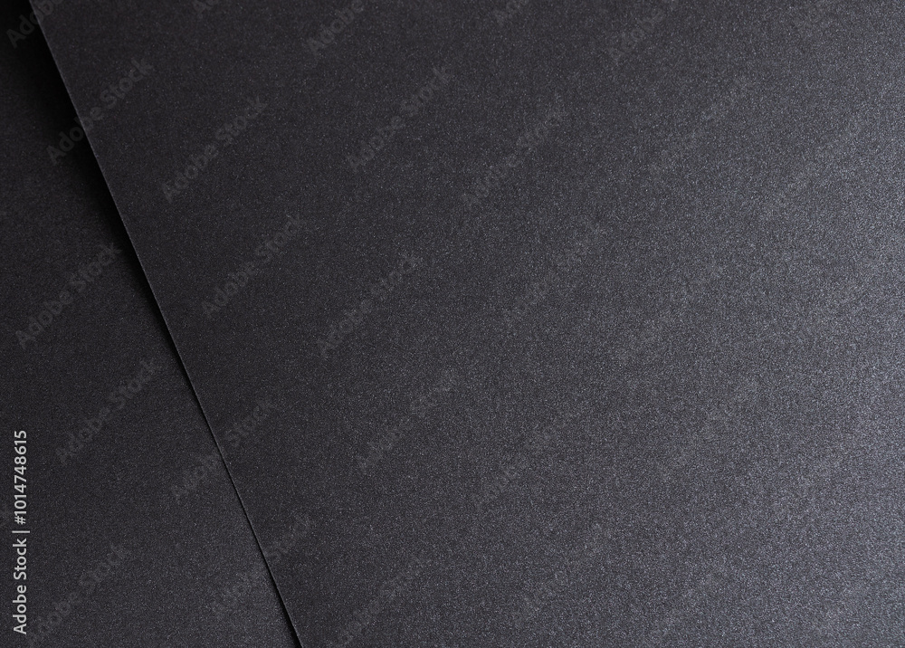 Poster black paper background with a smooth, dark texture, creating a grunge and modern aesthetic. blank