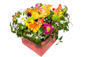 Bouquet of colorful flowers in pink box isolated on white background