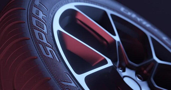 Close-up of sport tire rotating on dark background. Product visualization. Realistic 3d render.