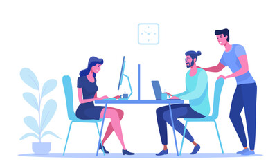 agency employees working at computers and exchanging ideas