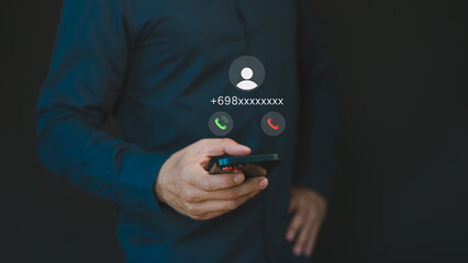 Person answering the incoming call. Phone call was from an unknown number. Call center gang or stranger. Hoax person with a fake identity. Concept of scam, fraud with a phone from the scammer.