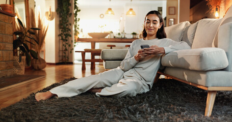 App, happy and social media with woman on floor in home living room for communication or online...