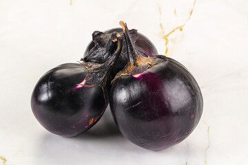 Raw violet and black eggplant