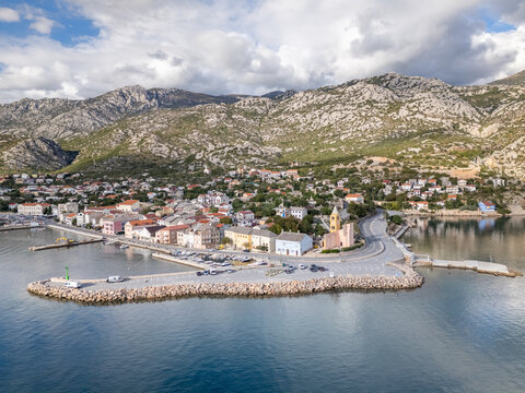 Aerial drone photo of the small coastal town and marina in Karlobag, Croatia.