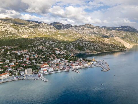 Aerial drone photo of the small coastal town and marina in Karlobag, Croatia.