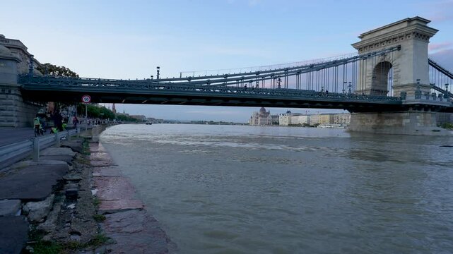 Budapest, Hungary - September 17, 2024: Rising Waters Begin to Breach the Banks: The Start of Flooding in Budapest After Storm 'Boris'. Zoom in transition. Original sound.