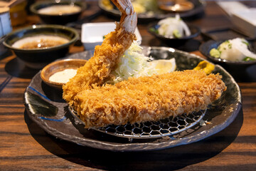 Japanese-style deep-fried thick-cut pork cutlet, fried black pork cutlet, photographed in Okinawa, Japan