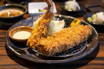 Japanese-style deep-fried thick-cut pork cutlet, fried black pork cutlet, photographed in Okinawa, Japan