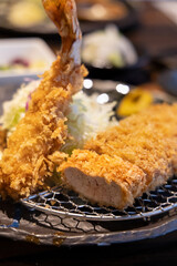 Japanese-style deep-fried thick-cut pork cutlet, fried black pork cutlet, photographed in Okinawa, Japan