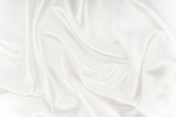 White satin silk wrinkled texture background.
