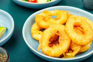 Delicious deep-fried calamari rings.