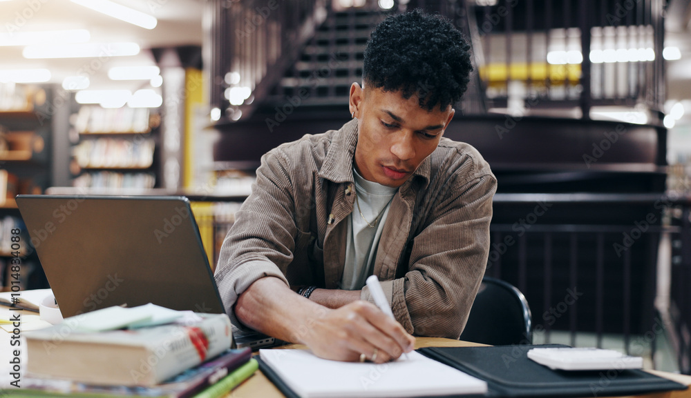 Poster writing, book and research with man in library for knowledge, education and college thesis. learning