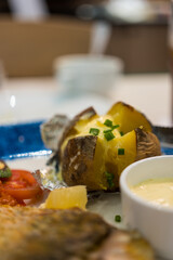 Hot baked potato. Selective focus