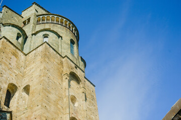 the facade and details of the facade of a medieval fortress in Europe. A monastery in northern Italy