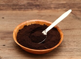 Coffee grounds in a bowl as natural organic fertilizer. Organic and cheap way how to manure plants...