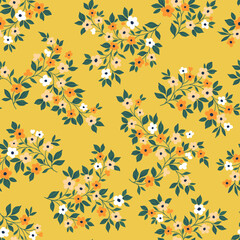 Vintage seamless floral pattern. Liberty style background of small pastel orange flowers. Small flowers scattered over a yellow background. Stock vector for printing on surfaces. Abstract flowers.