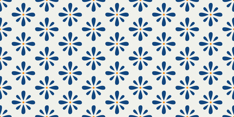 Seamless pattern with simple floral motif in blue