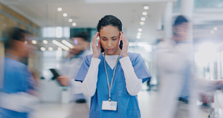 Nurse, woman and headache in hospital with stress of medical mistake, overworked and burnout....
