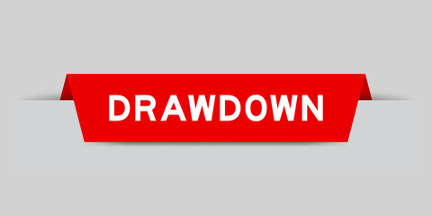 Red color inserted label with word drawdown on gray background