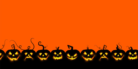 scary pumkin faces in line with orange background