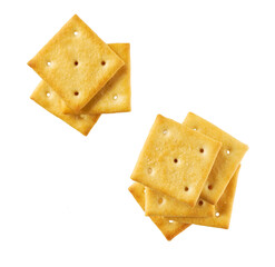 Stack of square crackers isolated on white background, top view.