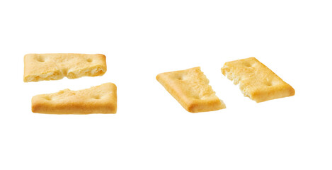 Broken square crackers isolated on white background.