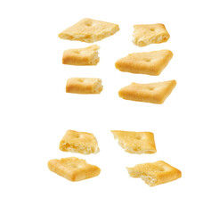 Broken square crackers isolated on white background.