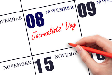 November 8. Hand writing text Journalists' Day on calendar date. Save the date.