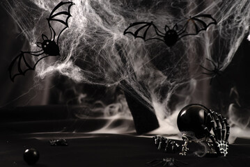 Divination ball, candles, skeleton and spider- a fall witch's Halloween scene.