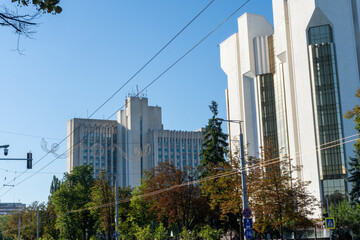 View of the Presidency of the Republic of Moldova, a majestic building surrounded by greenery -...