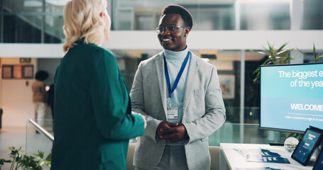 Welcome booth, conference and summit with business people at expo for tradeshow, information or...