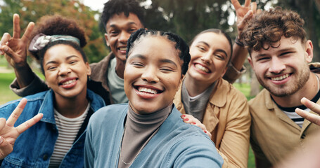 Fototapeta premium Selfie, students or peace sign in portrait at college for campus memory, social media post or profile picture update. Study group, diversity or friends in photograph at university with break or happy