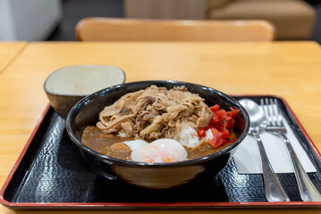 Beef rice bowl with egg, Gyudon, Yakinikudon Japanese food.