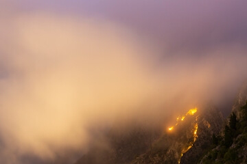 Lights at the cloudy night in the mountains, Montenegro
