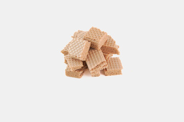 A pile of broken wafers on a white background
