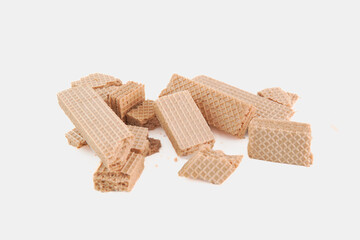 A pile of broken wafers on a white background