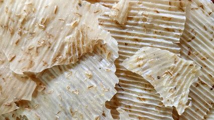 Marash tarhana which is made form wheat, yoghurt, thymes and dried as thin plates, and eaten both as a soup and as snacks or crackers.