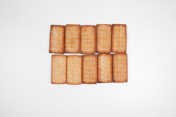 A pile of crackers with holes in them