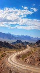 Desert Road to Mountains, a winding path through arid terrain, leading toward majestic mountain peaks, surrounded by vast stretches of golden sand and sparse vegetation.