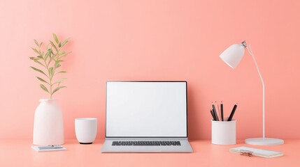 Modern Workspace with Laptop on Coral Background