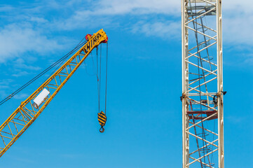 Boom of a construction crane against the sky.