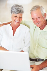 Senior couple, laptop and home for blog, surfing social media and internet for communication. Elderly people, relax and together for bonding in living room, reading funny ebook and streaming comic