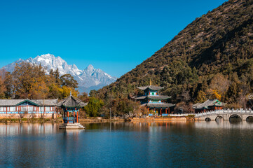 Heilongtan Park in Lijiang, Yunnan, China offers a view of the distant Yulong Snow Mountain.