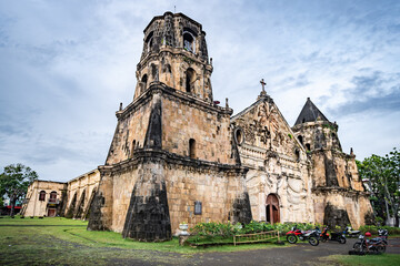 Fototapeta premium Miag-ao Church, Iloilo, Philippines. An 18th-century place of worship built by Spanish Catholic missionaries featuring Baroque architecture considered UNESCO world heritage site