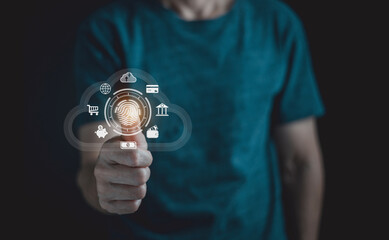 Cyber security concept. Man using thumb to scan finger print or for digital processing biometric identification to access security system includes internet banking, cloud system and mobile phone ,