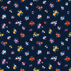 Ditsy floral pattern. Pretty flowers on dark blue background. Printing with small colorful flowers. Cute print. Seamless vector texture. Stock pattern. Printing on surfaces. Abstract flowers.