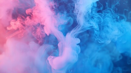 Fototapeta premium Colorful smoke swirls in shades of pink and blue create an ethereal atmosphere.